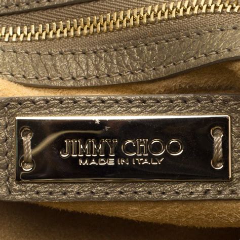 how to tell real versus fake jimmy choo bag|jimmy choo real shoes.